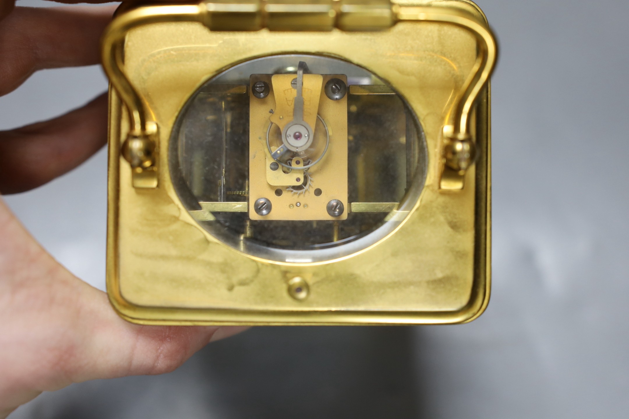 A French brass repeating carriage clock. 18cm tall